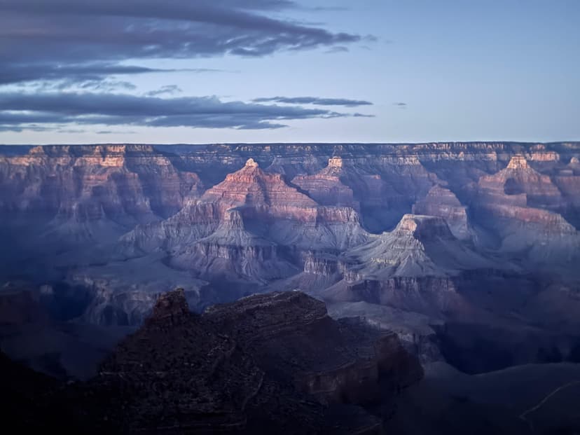 Traditional desert hut lit warmly at dusk