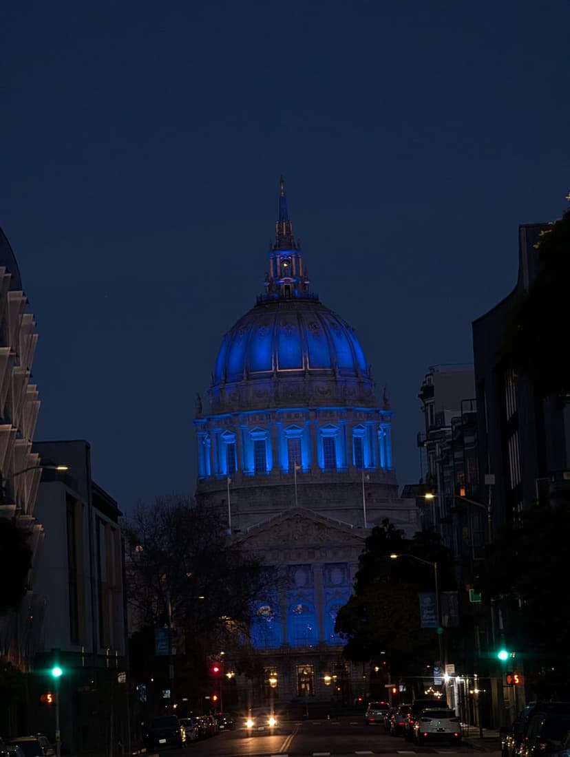 San Francisco City Hall illuminated in blue lights at night
