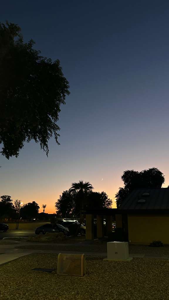 Dusk settling behind quiet streets