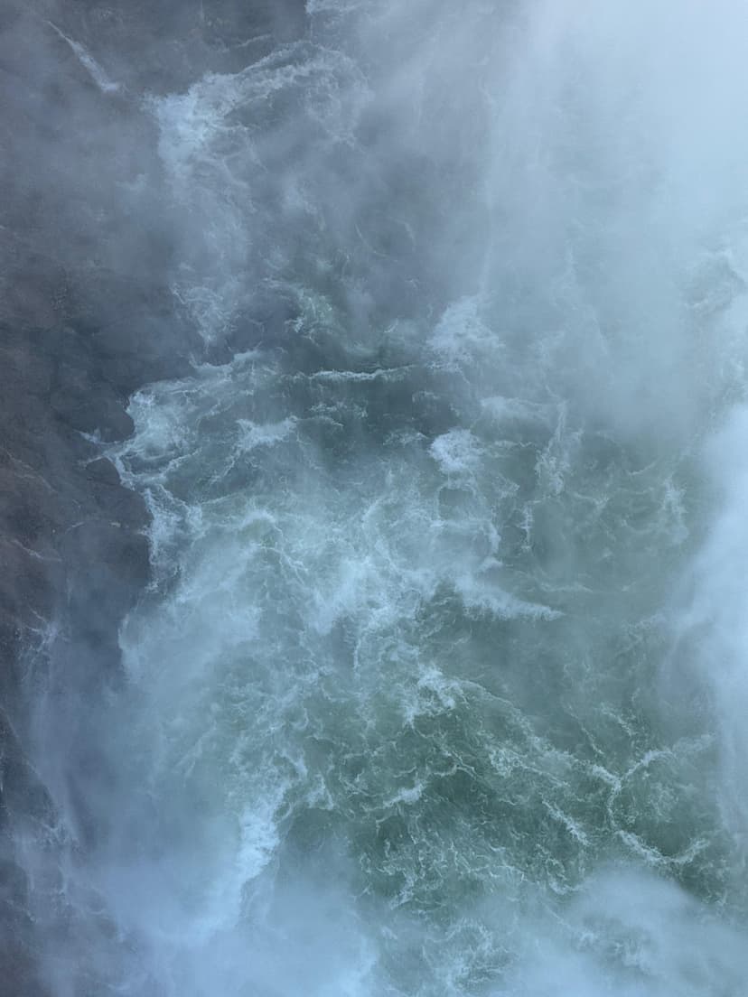 Powerful misty waterfall viewed close-up inside Yellowstone National Park